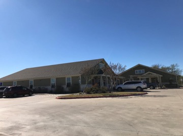 Photo of buildings located at 4409 John Stockbauer Dr in Victoria, TX on a commercial real estate property for sale.