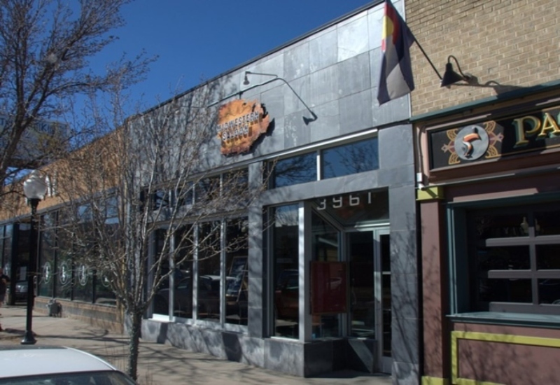 Photo of the restaurant building on 3961 Tennyson St, that recently sold.